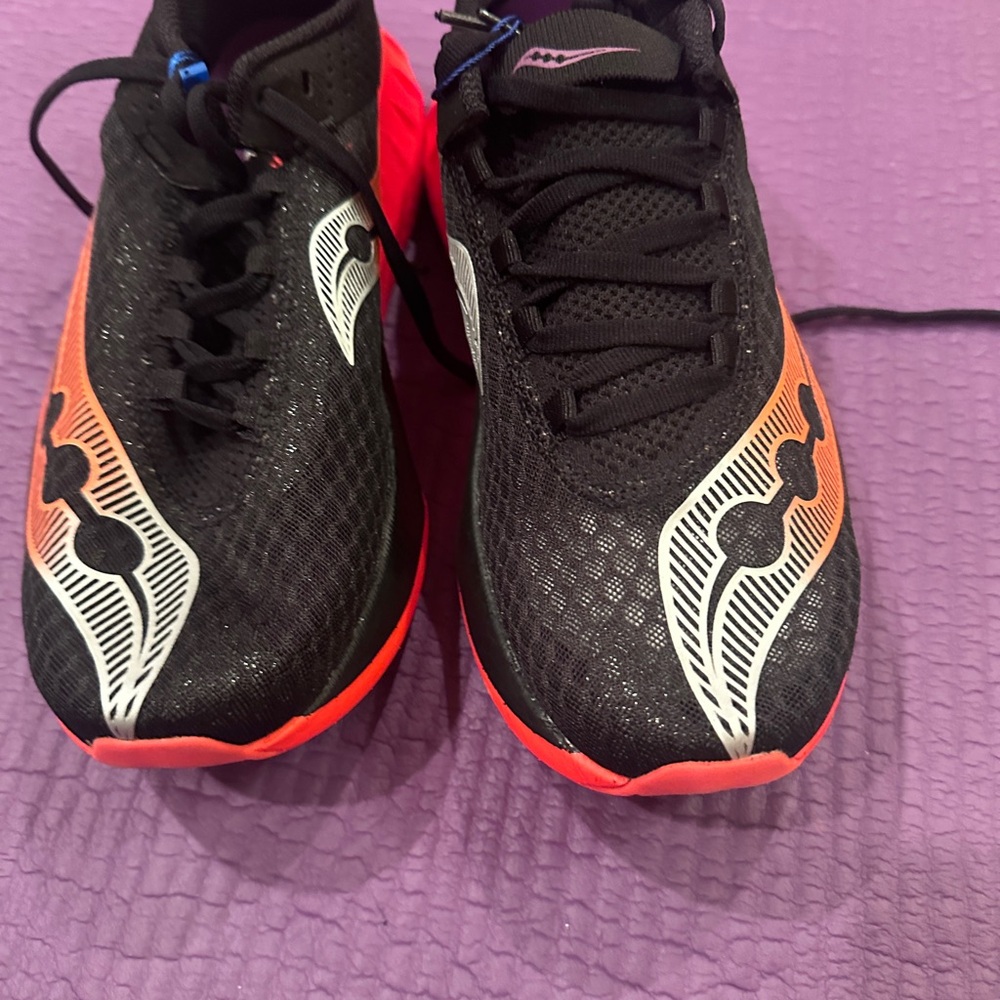 Saucony Black and Orange Endorphin Pro Race Shoes